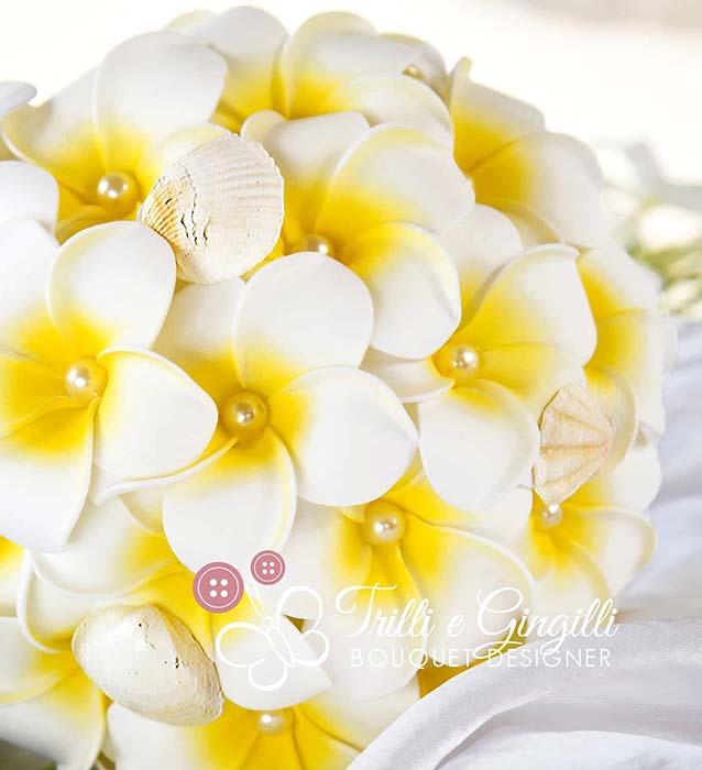 bouquet frangipani tema mare conchiglie