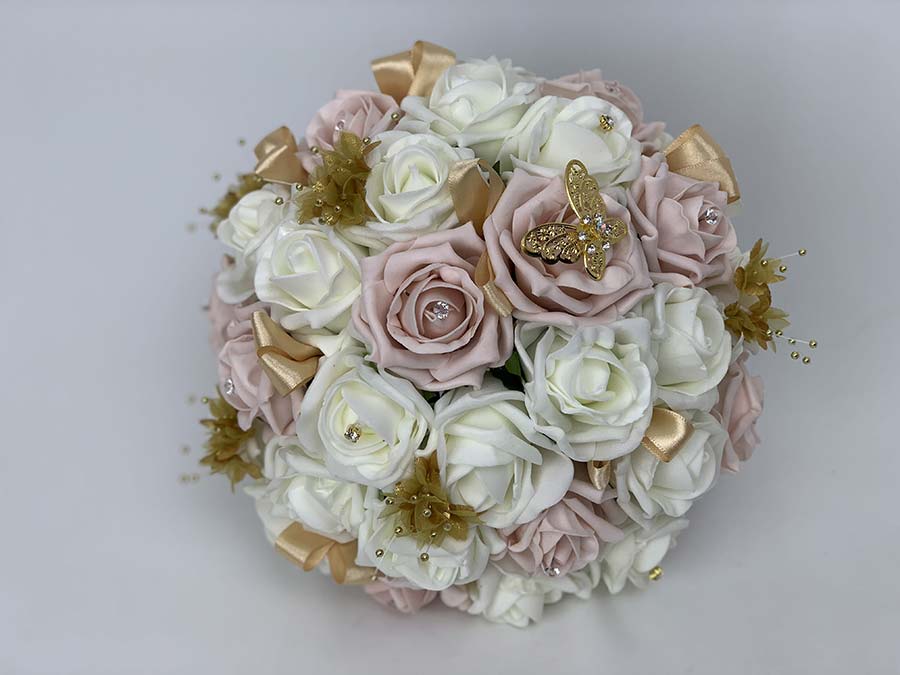 Bouquet di farfalle oro e rose